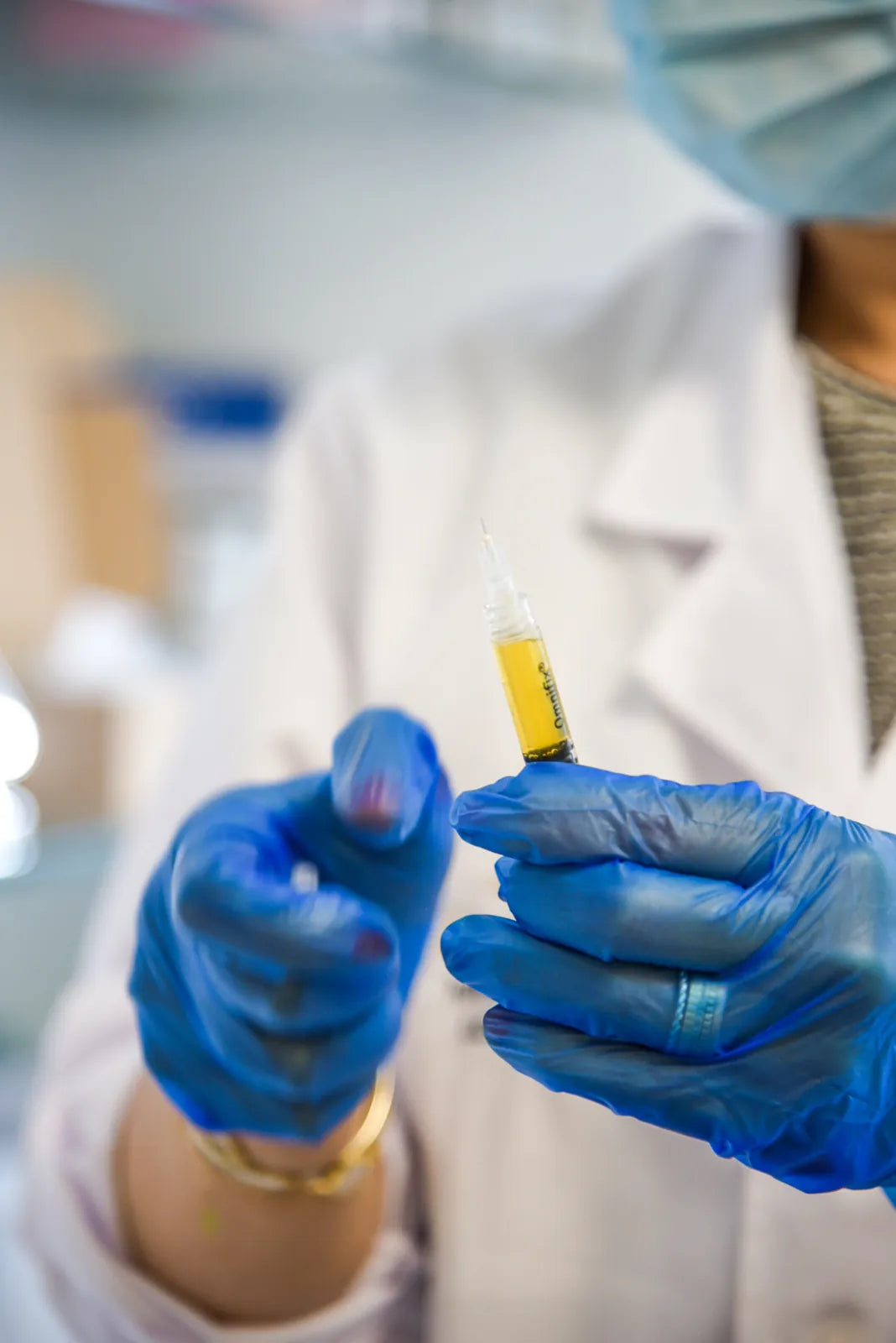 PRP syringe in motion